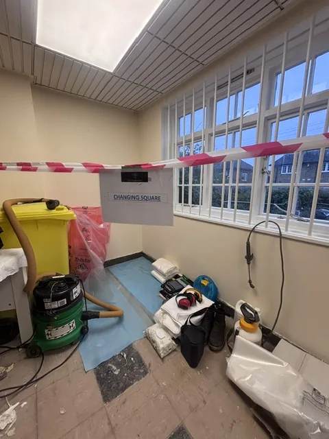 Asbestos floor tile and bitumen removal in Mortlake